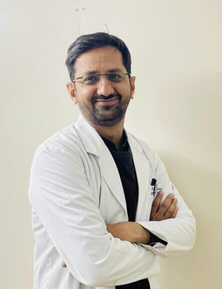 Doctor posing for camera with folded hands
